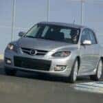 Gray Mazda Speed3 Hatchback Open Road