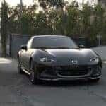 Black Mazda MX5 Miata Sports Car Trees