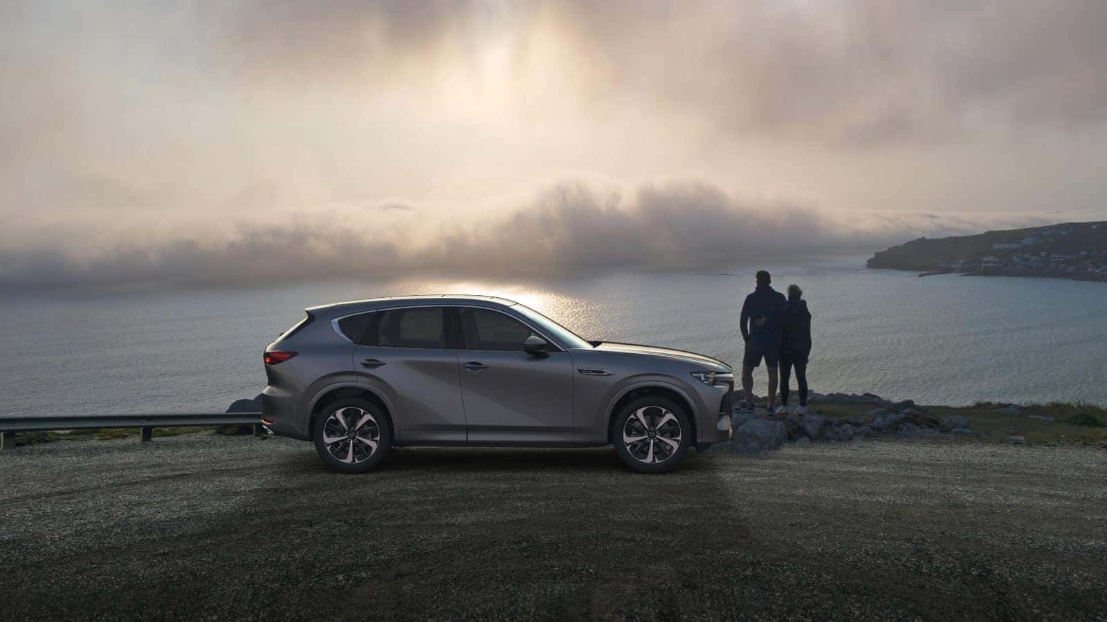 Gray Mazda CX-60 SUV Water People Sky