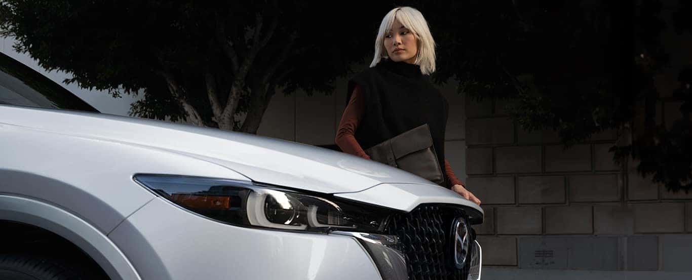 White Mazda SUV White Woman