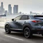 Blue Mazda CX-30 SUV Buildings