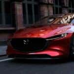 Red Mazda Sedan Streets Red Building