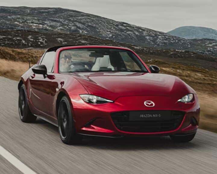 Red Mazda MX-5 Miata Sports Car Green White Mountains