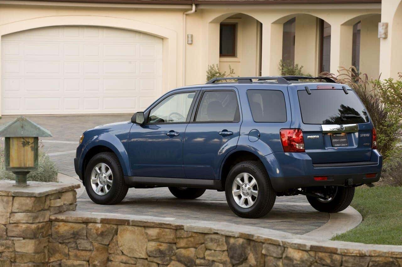 Blue Mazda Tribute SUV Stone