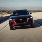 2025 CX-90 On the Highway in the daytime.