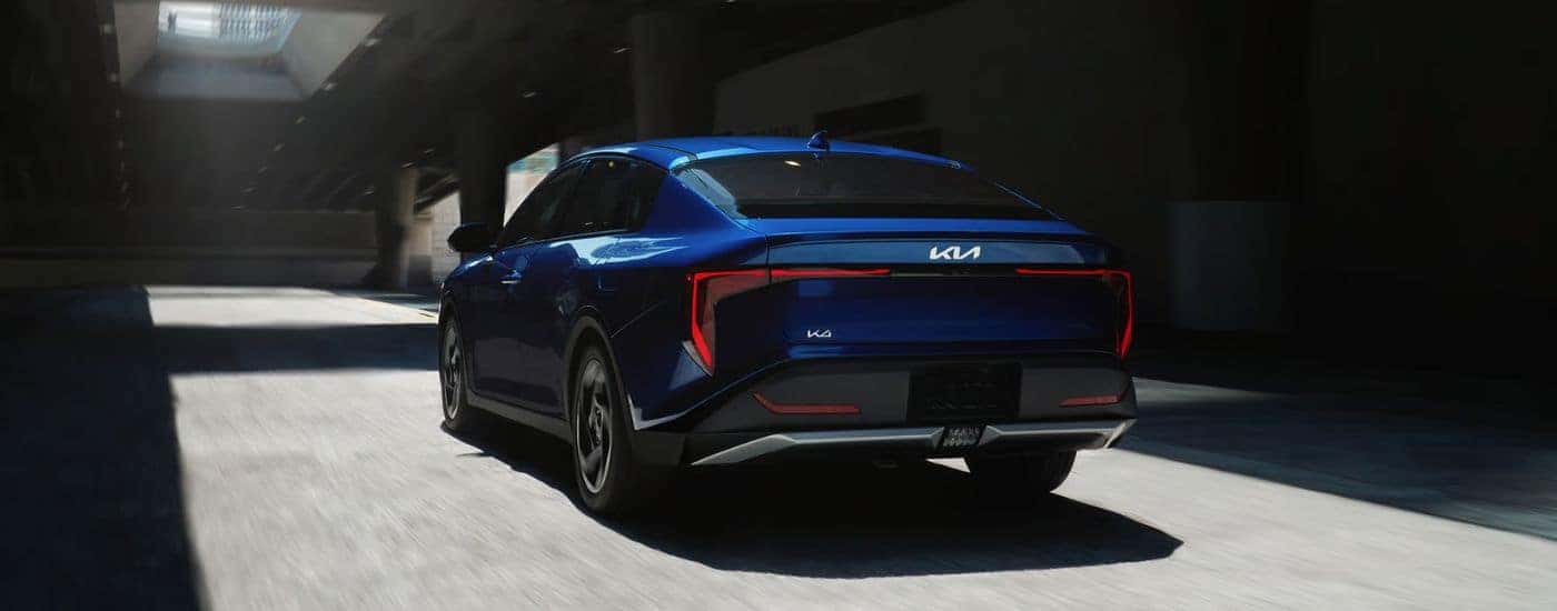 2026 Deep Sea Blue Kia K4 shown from the rear.