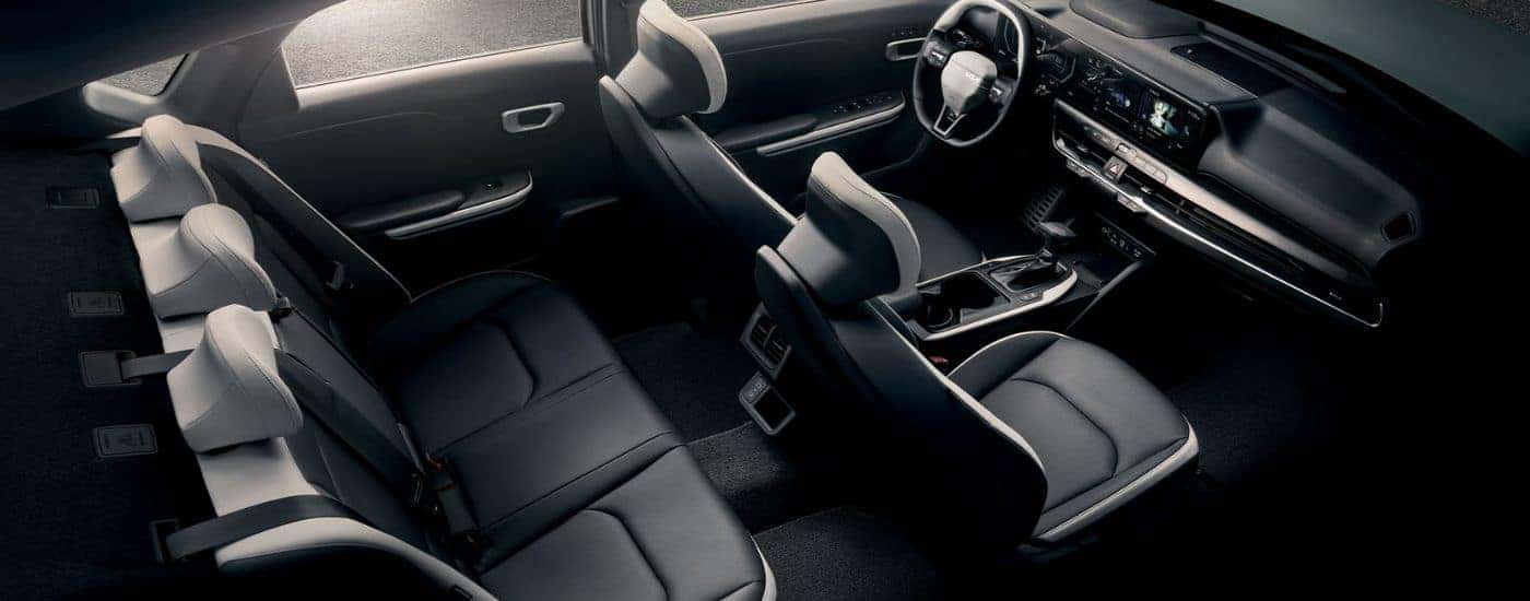2026 Kia K4 GT-Line Turbo interior showing front and rear seats.