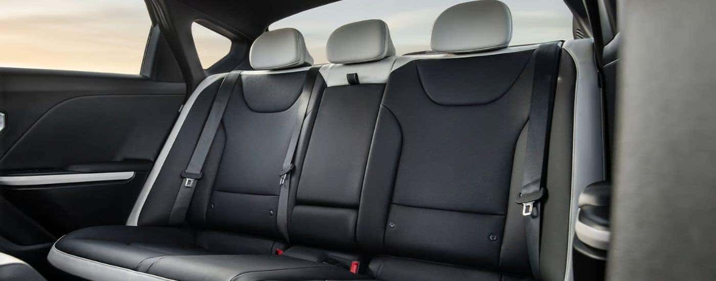 The black and white rear folding seats on a 2026 Kia K4 Gt Line.