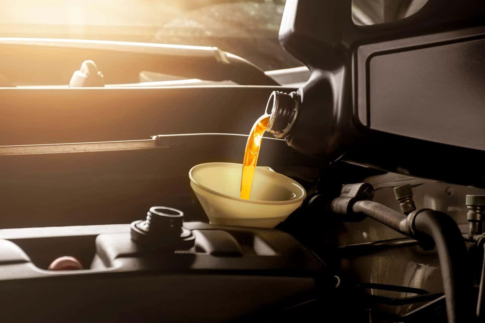 Oil being poured into engine