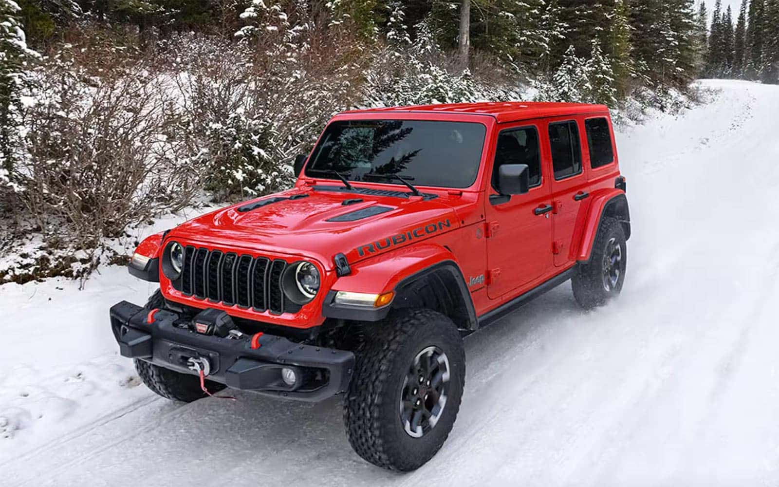 Red 2026 Jeep Wrangler in the snow