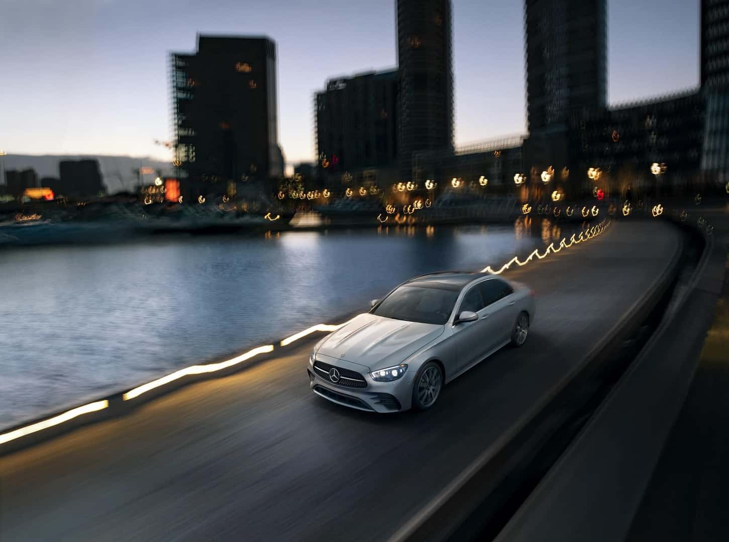 2022 Mercedes Benz E-Class driving in the city