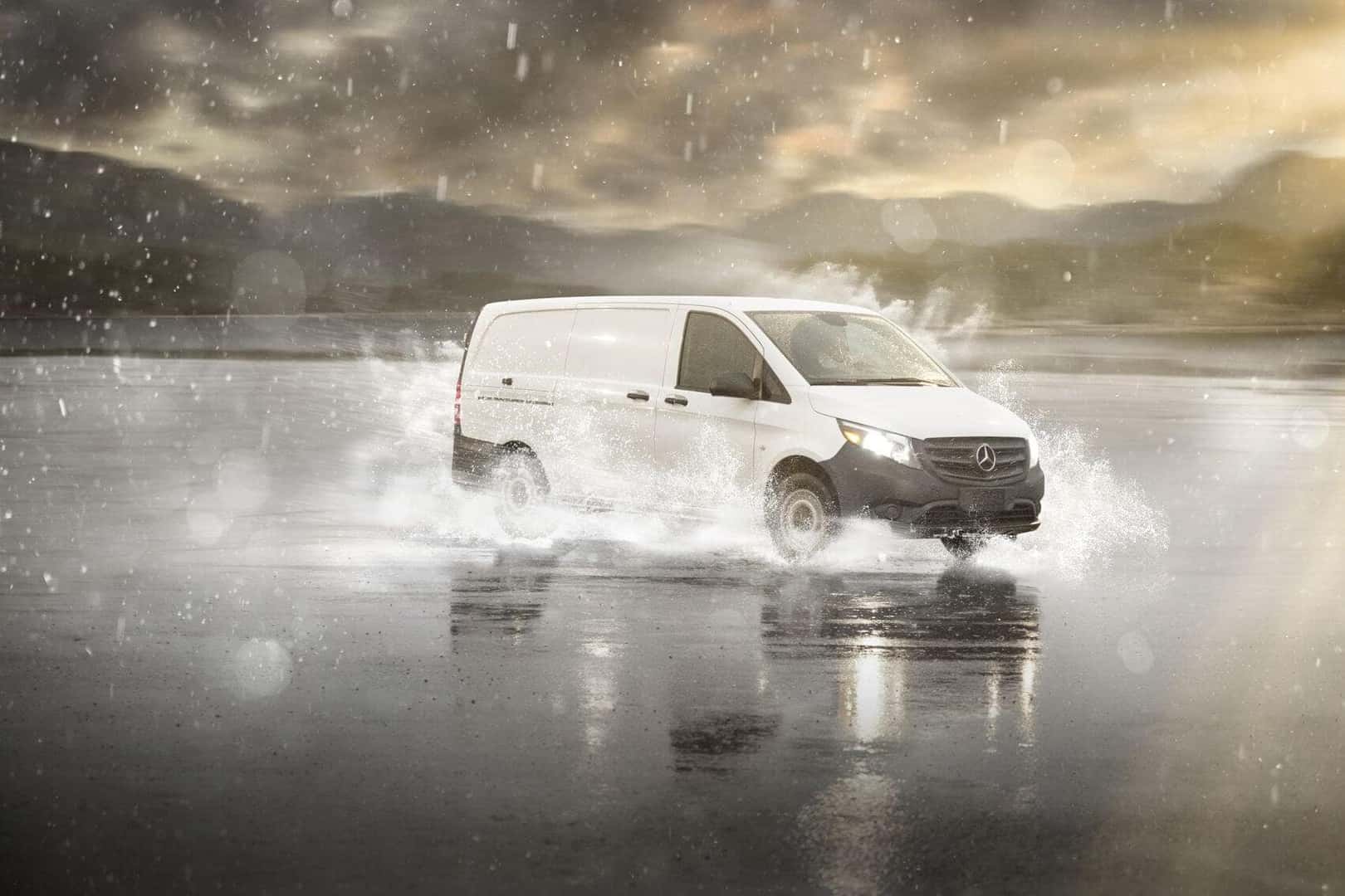 Metris Cargo Van splashing through water