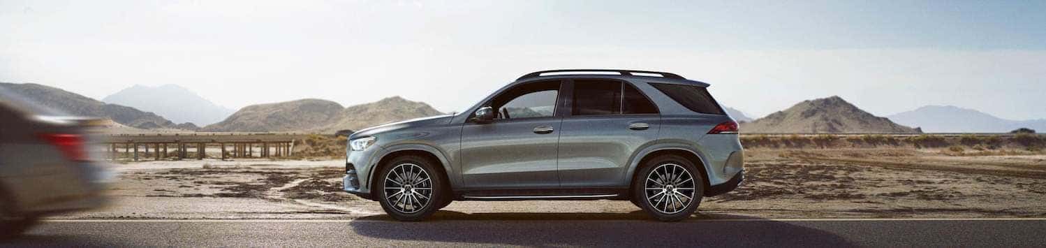 Side view of a 2022 Mercedes-Benz GLE driving on the road