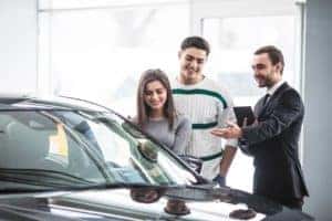 Test driving a Mercedes-Benz at the dealership
