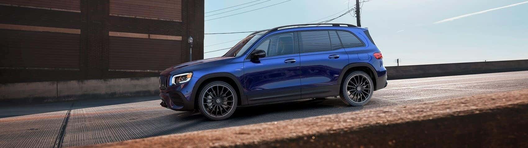 2022 Mercedes-Benz GLB in blue driving down the road