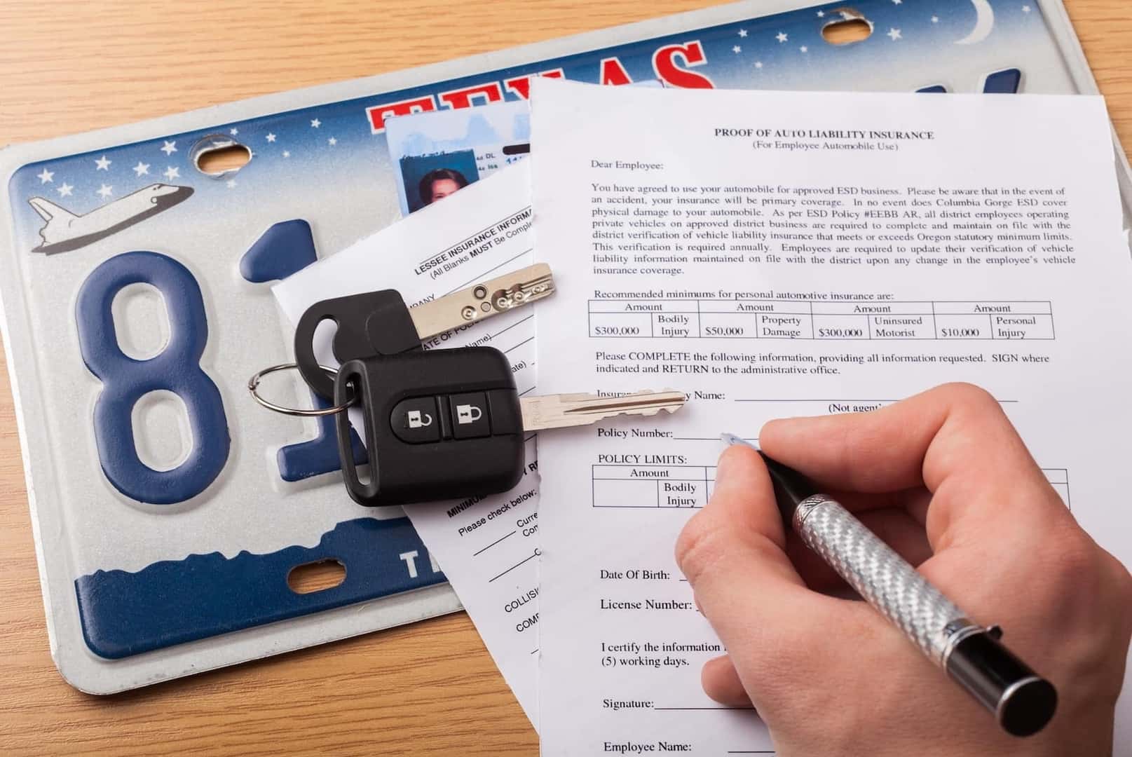 Completing financing paperwork for a Mercedes-Benz