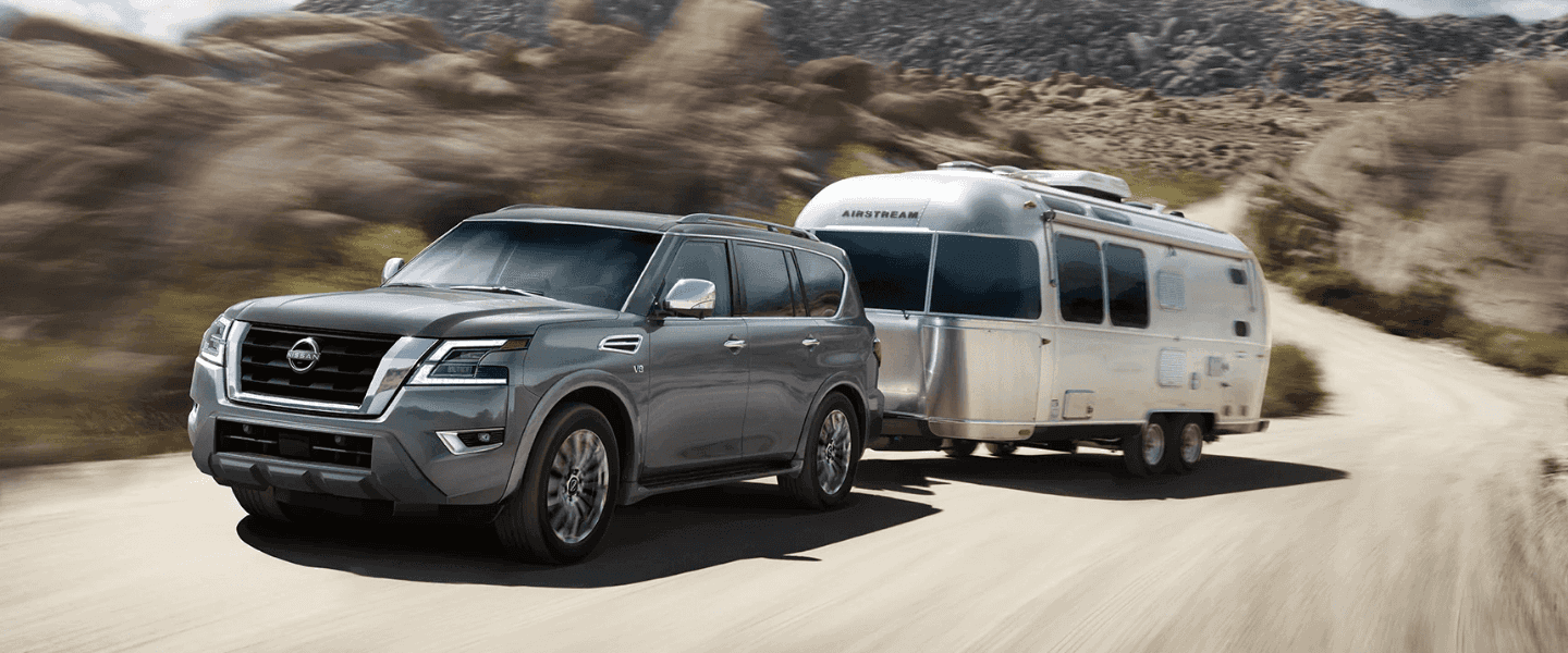Gray Nissan Armada towing