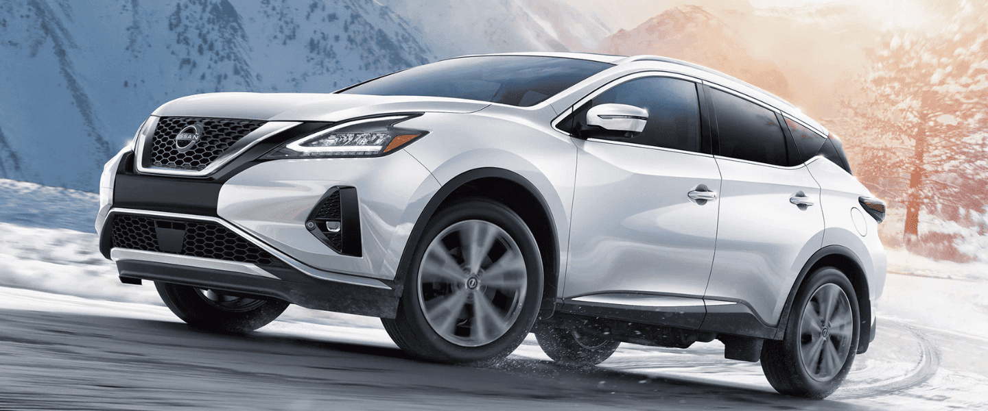 White Nissan Murano in the snow