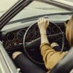 A woman driving a car