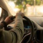 A man driving a car