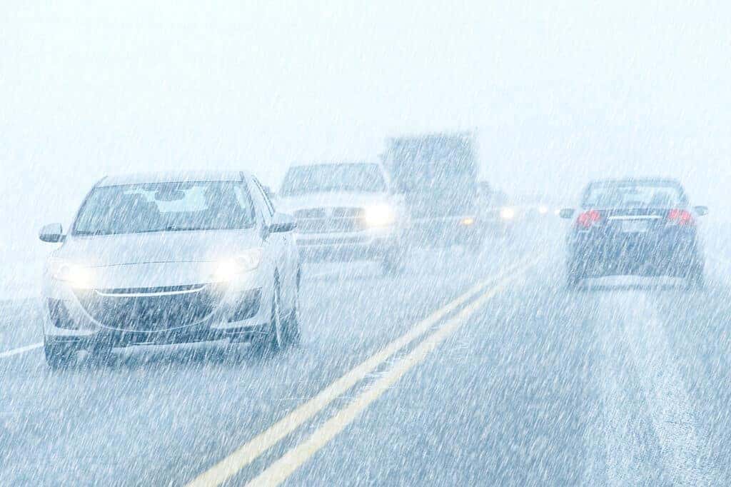 Cars Driving in Snow