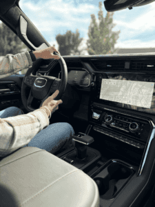 1. 2026 GMC Sierra AT4X touchscreen and driver display in Boyertown PA