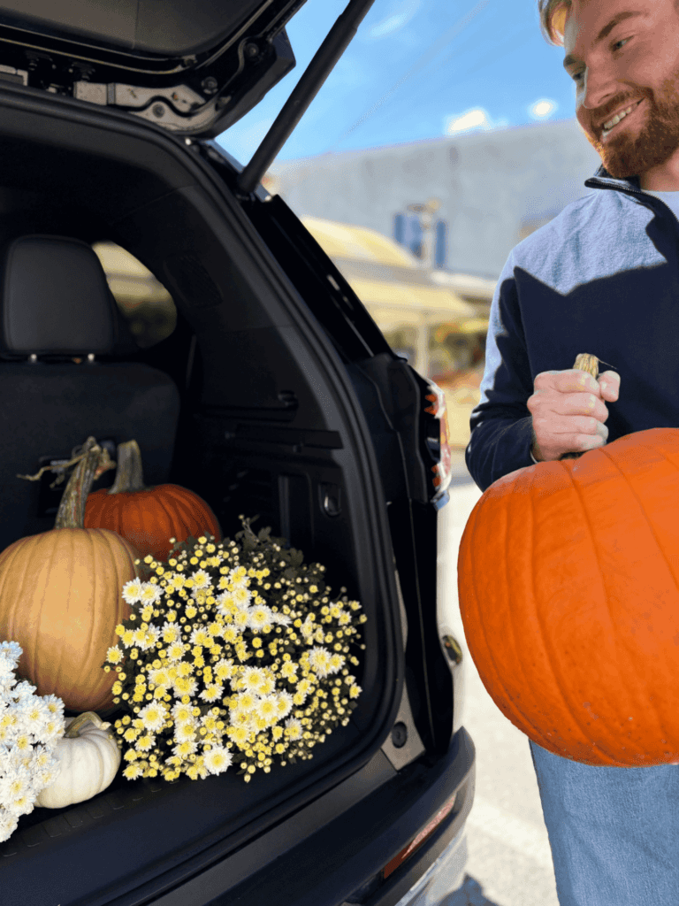 2027 GMC Acadia cargo space filled with pumpkins and fall mums near Boyertown PA