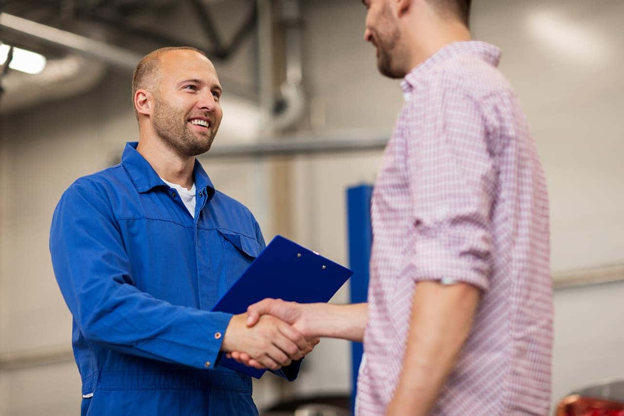 Customer and Technician Shaking Hands