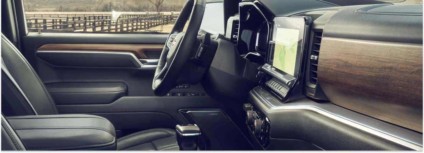 Interior dashboard and touchscreen infotainment system of a 2026 Chevrolet Silverado 1500.
