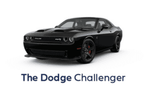 Black Dodge Challanger against a white back drop