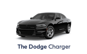 black dodge charger against a white back drop