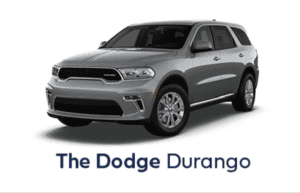 Grey Dodge Durango With silver decals against a white backdrop hghlighting the cars exterior