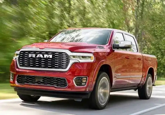 Red 2027 RAM 1500 showing its grille surround and fender flares