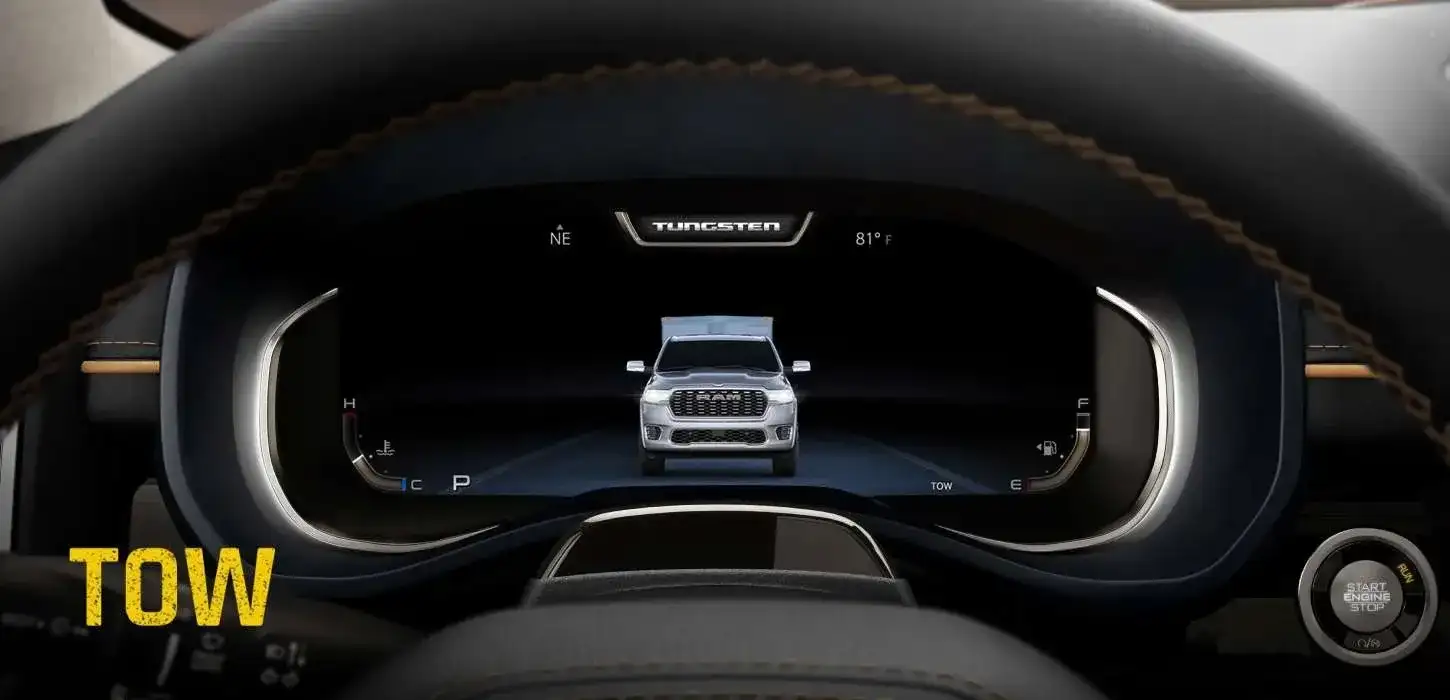 Digital cluster display showing Tow drive mode