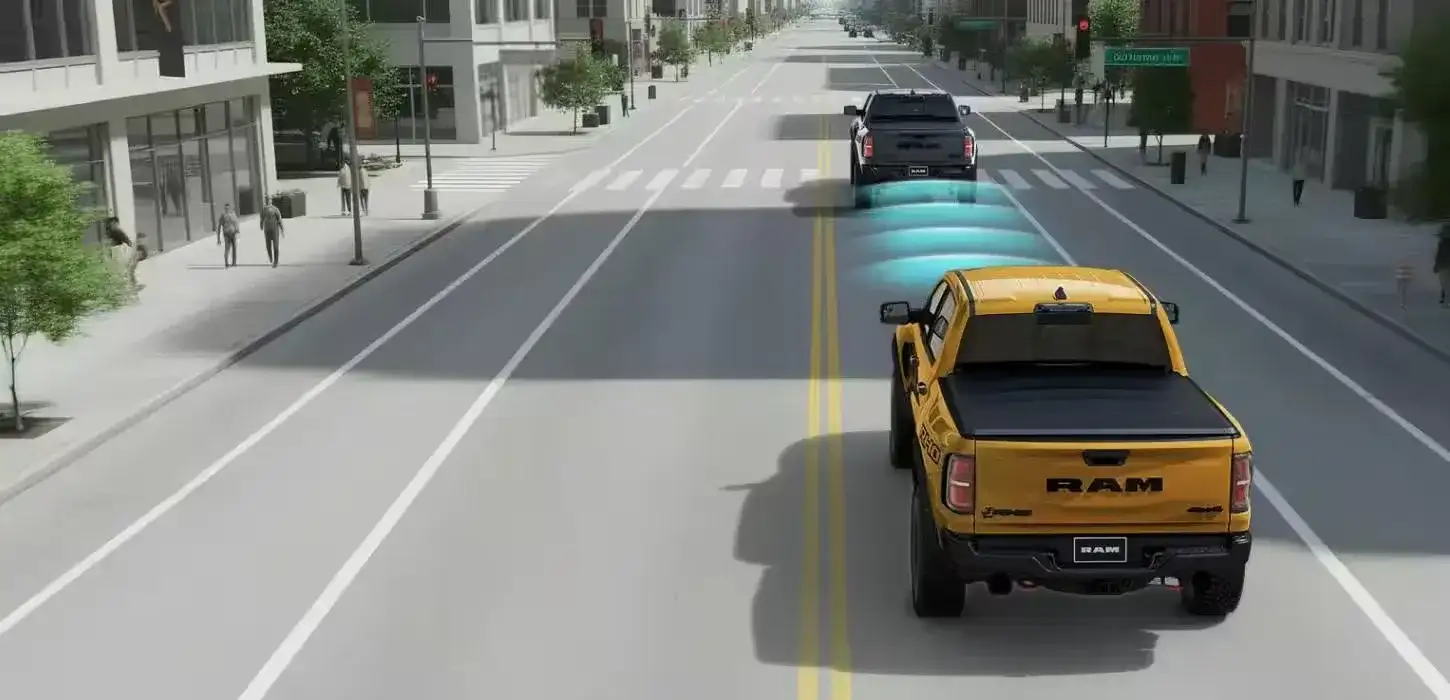 Illustration of Evasive Steering Assist guiding a RAM 1500 into a clear lane