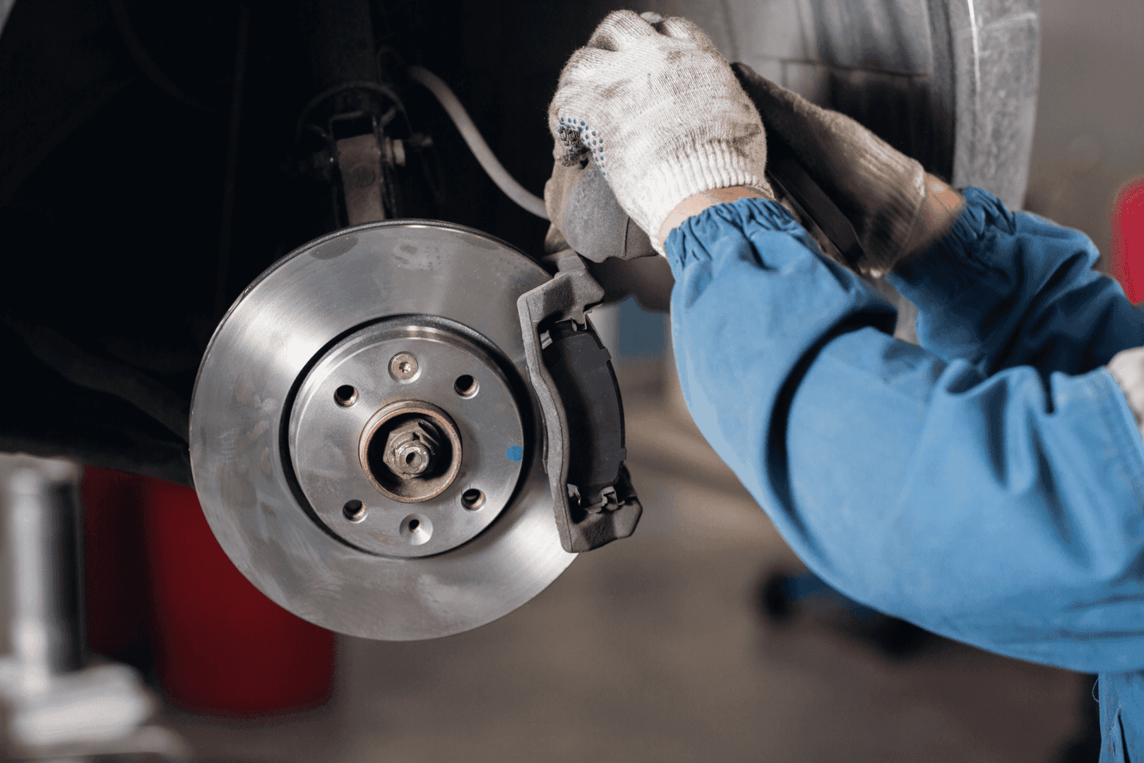 Technician repairing the Brakes