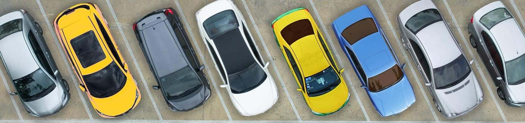 View of parked cars from above near Quincy MA