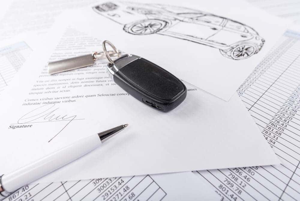 Car keys on top of MINI financing paperwork