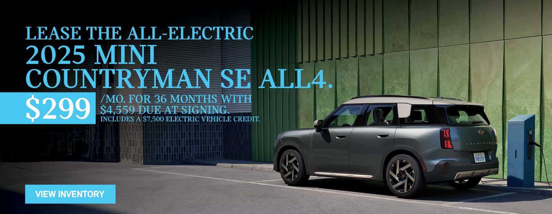 MINI Countryman Parked in front of green wall