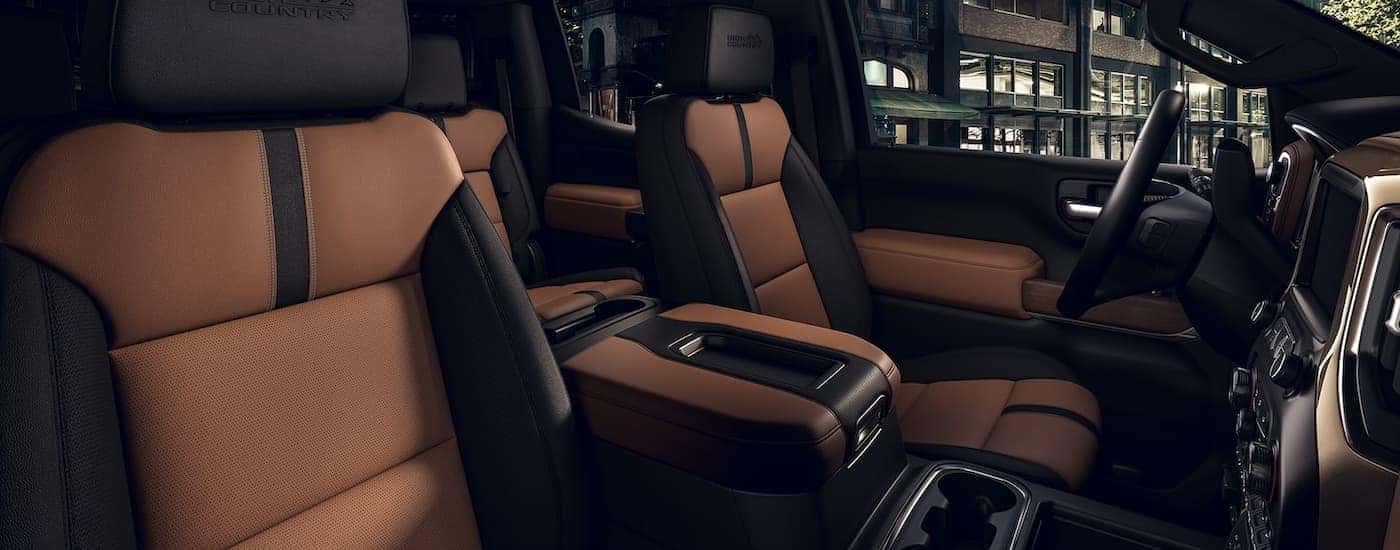The brown and black leather interior is shown in a 2022 Chevy Silverado 1500 High Country.