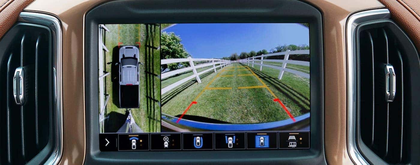 The infotainment screen in a 2022 Chevy Silverado 2500 HD shows a back up camera view.