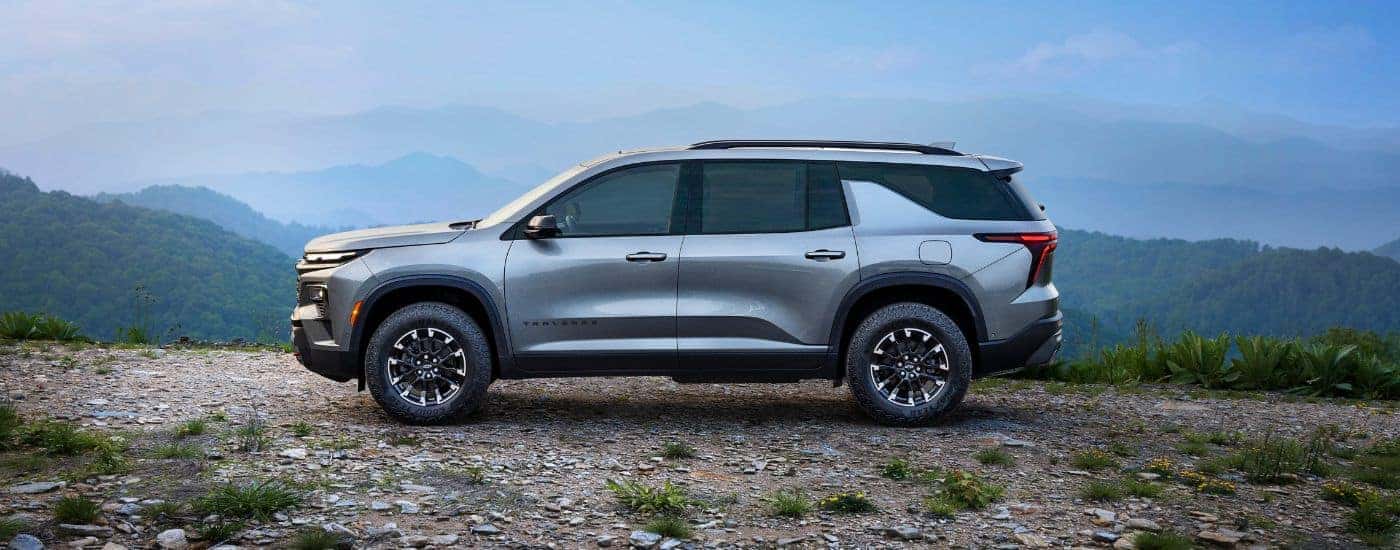 Side angle view of a silver 2024 Chevy Traverse Z71.