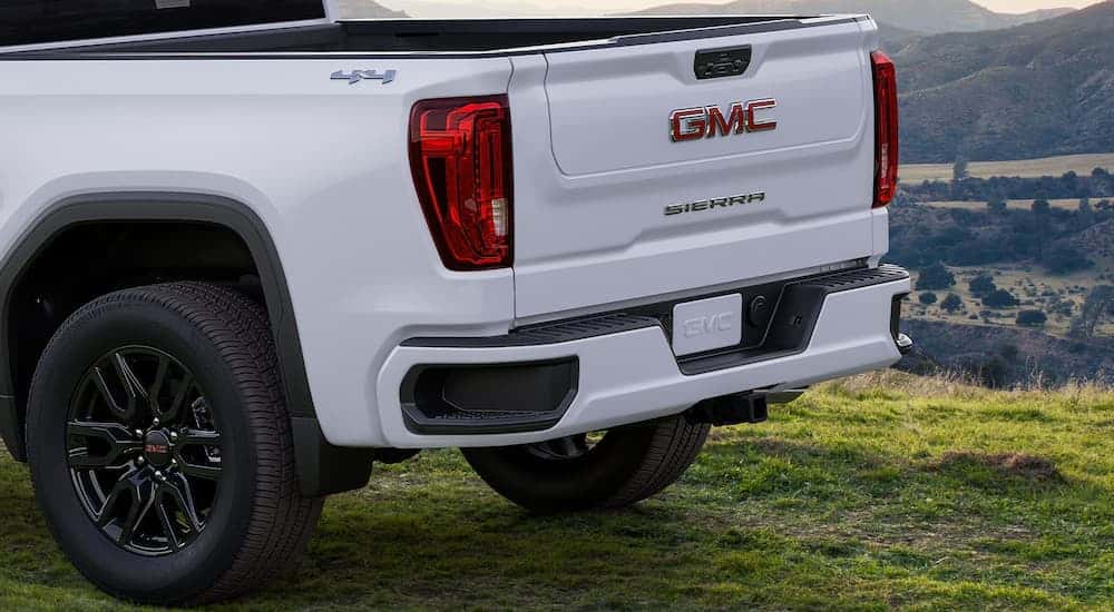 Rear view of the tailgate of a white 2025 GMC Sierra 1500 Pro.