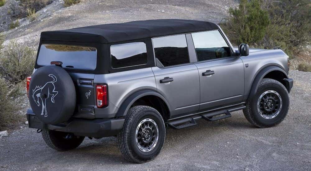 A silver 2025 Ford Bronco Big Bend is shown parked off-road.