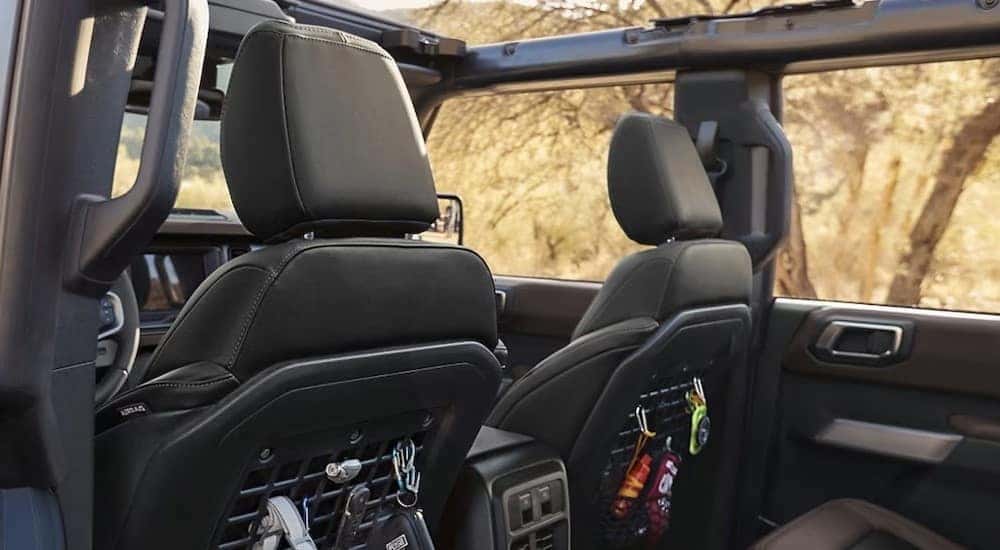The black interior is shown in a 2025 Ford Bronco for sale.