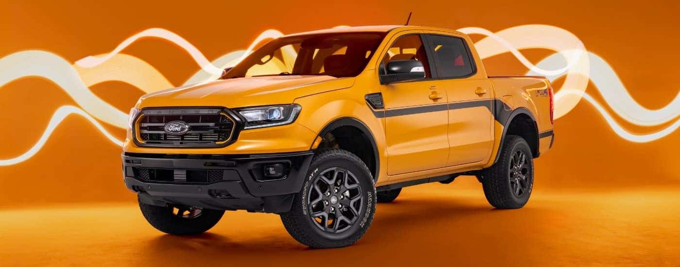 An orange 2022 Ford Ranger Splash Package is shown against an orange background.