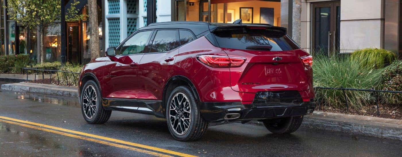 A red 2023 Chevy Blazer RS is shown from the rear at an angle.