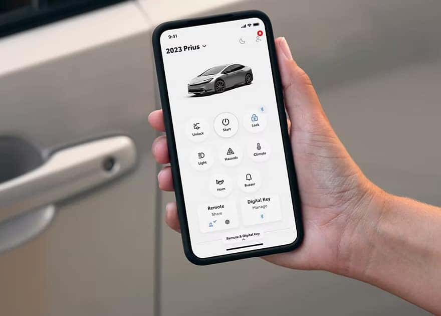 a person using the toyota app to unlock their 2023 prius