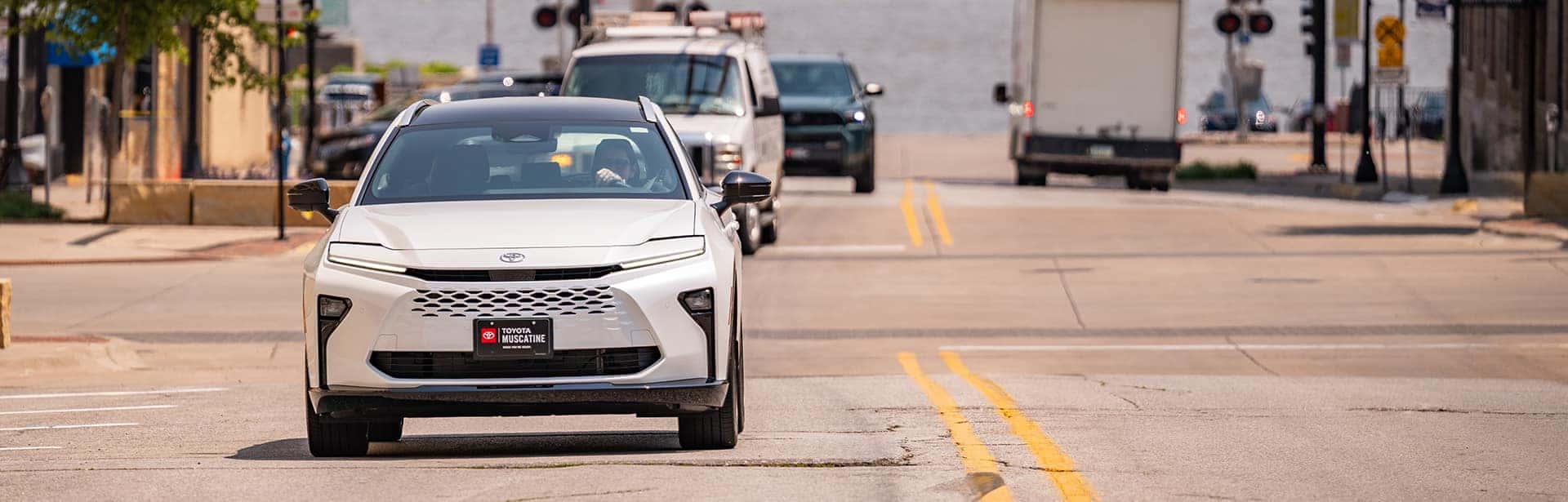 a new toyota crown signia from toyota muscatine in front of the mississippi river in muscatine iowa