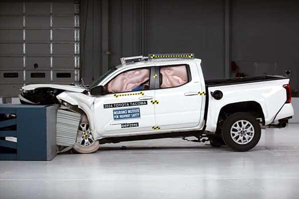 a new toyota tacoma performing a crash test iihs